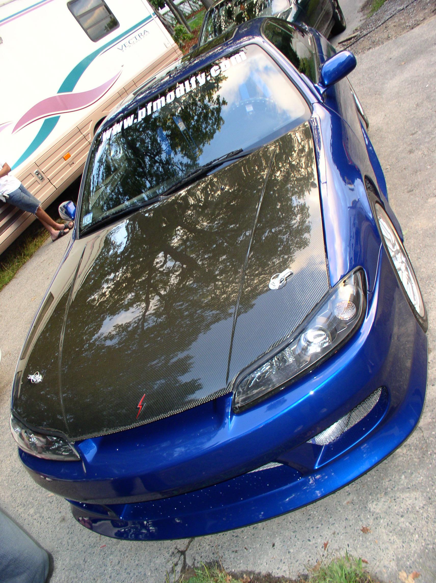 240SX — three-quarter front view, carbon hood