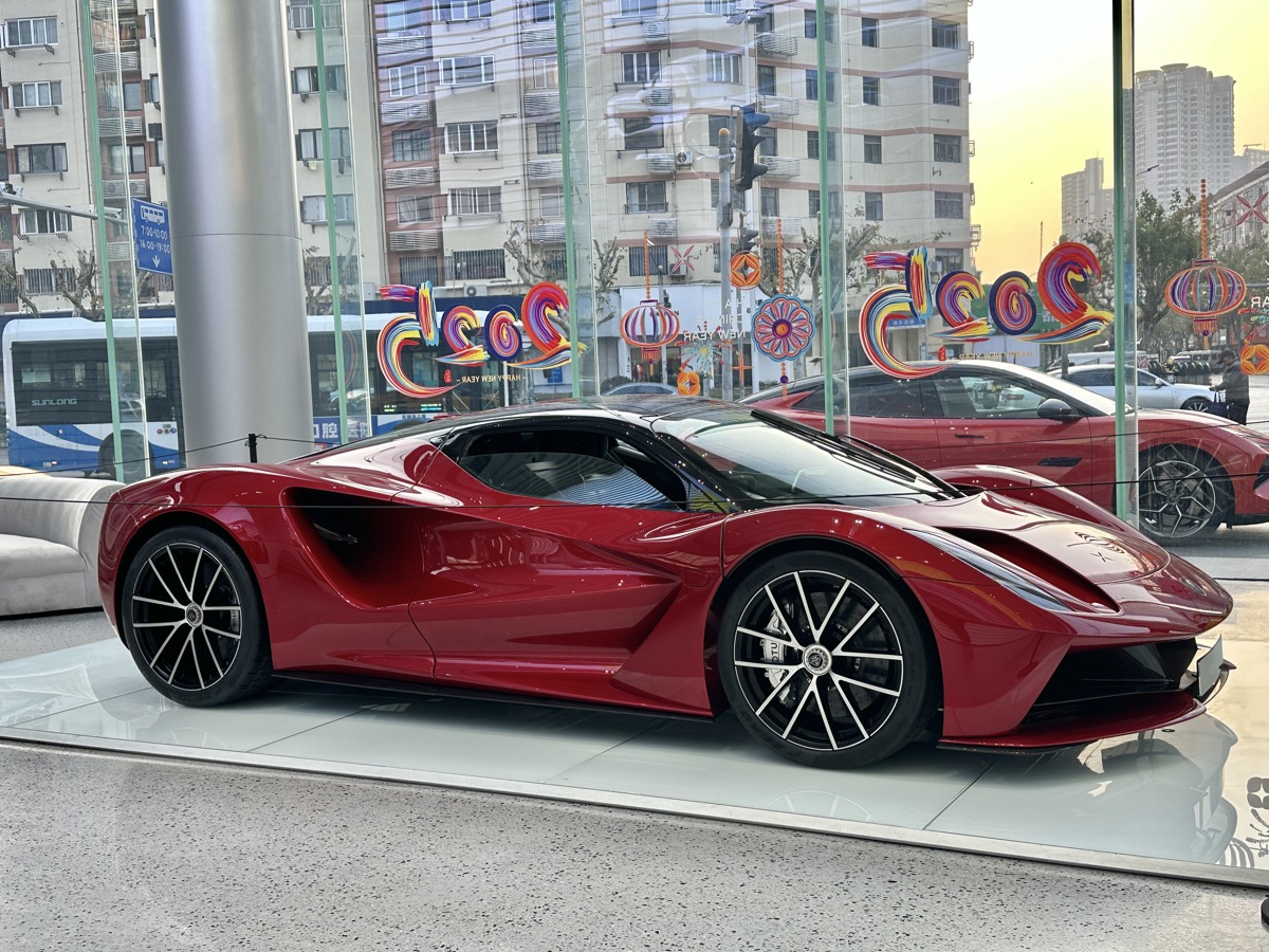 Lotus Evija — carbon monocoque at 129kg, 2,000hp from four electric motors, 130 examples total
