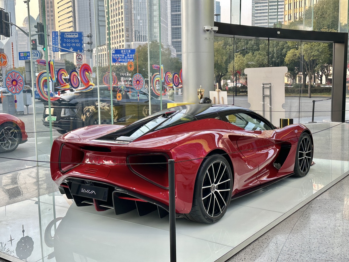 Lotus Evija rear — the distinctive tunnel design channels airflow through the body, aerodynamics as sculpture