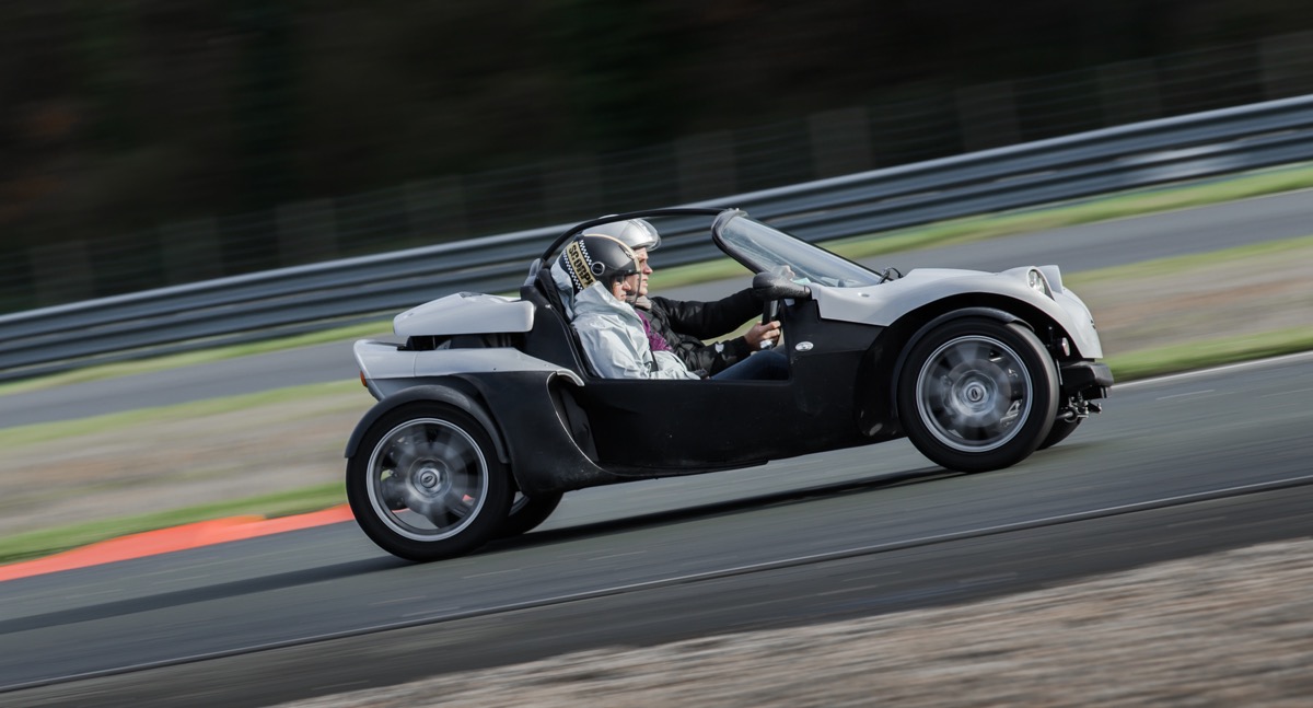 Cars on circuit at a club racing event — road cars on track, the real HPDE experience