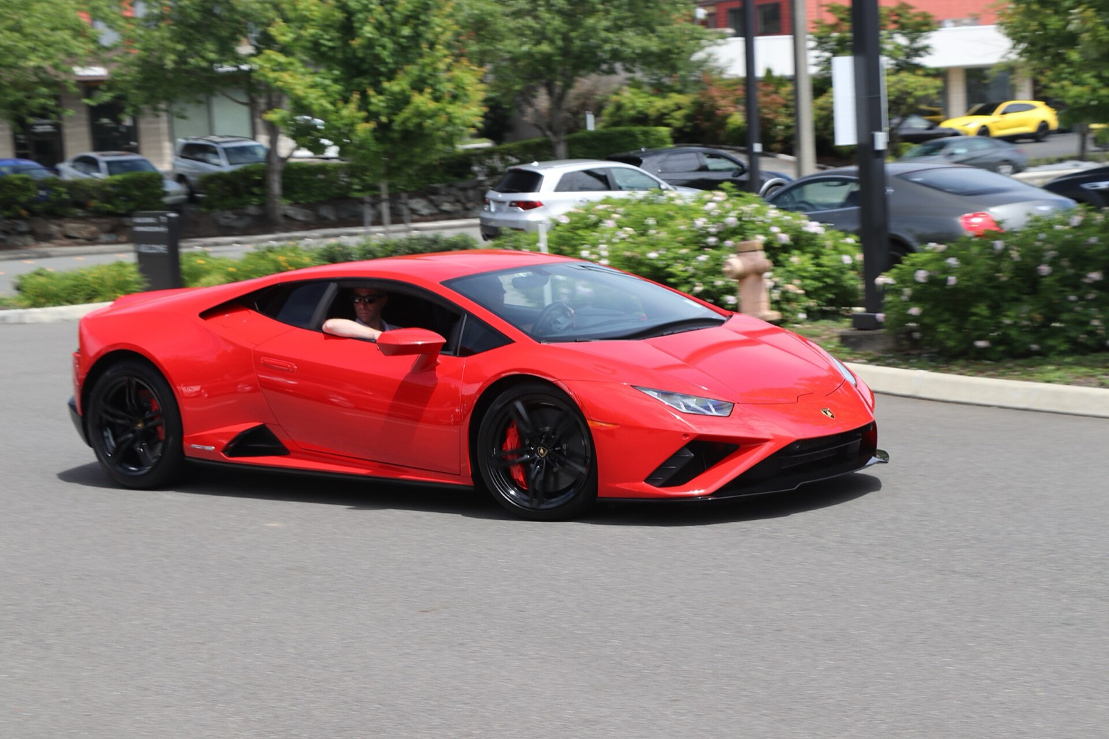Lamborghini Huracan EVO in Rosso Arancio, in motion
