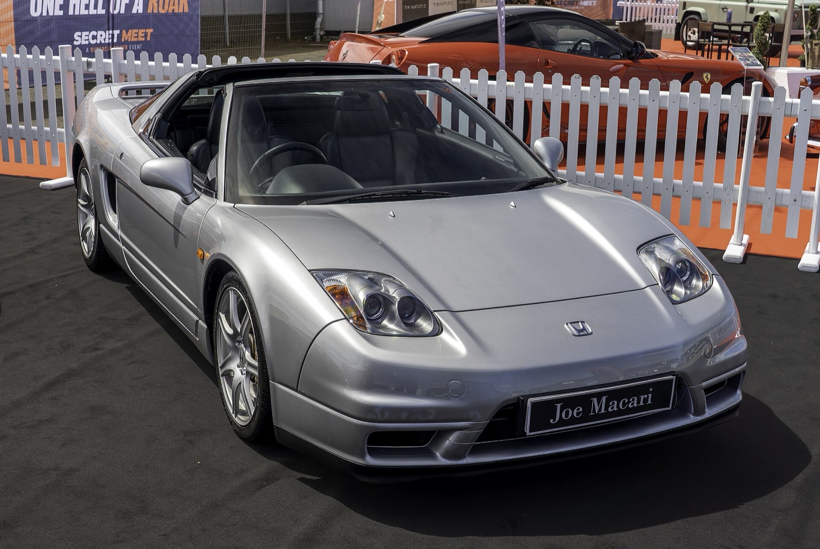 Silver 2003 Honda NSX-T with the targa roof panel removed