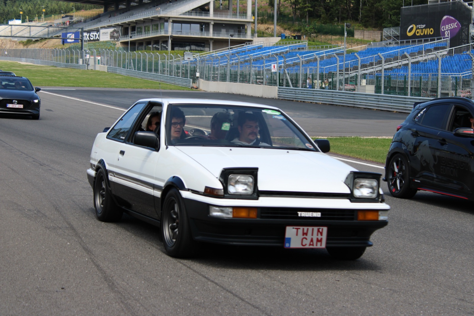 Toyota AE86 rear three-quarter view showing original wheel design